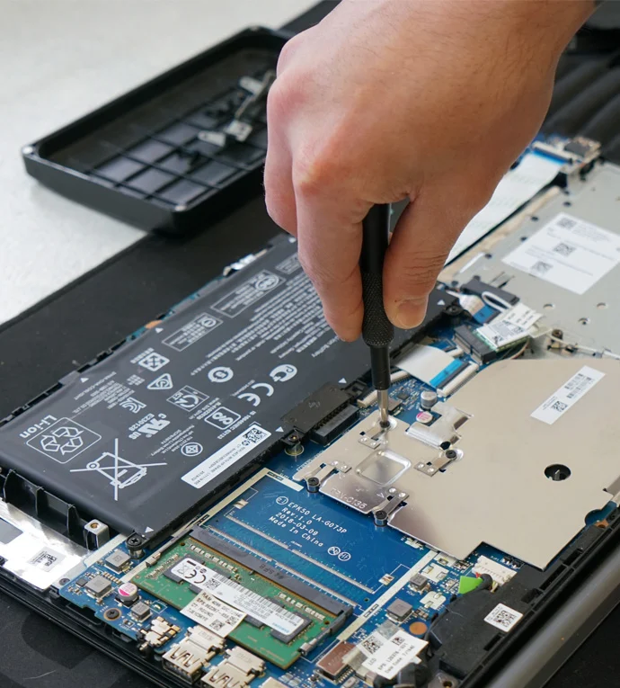 Mechanic is repairing and upgrading IT Devices